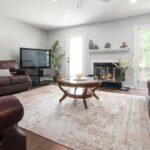 three smart tv placements near fireplace